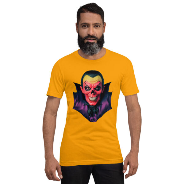 Man wearing vampire graphic yellow T-shirt