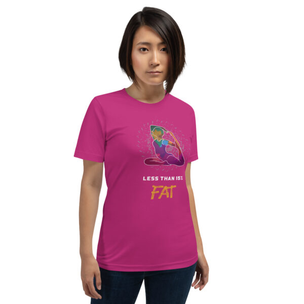 Person wearing pink T-shirt with graphic design.