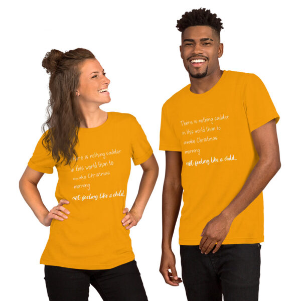 Models wearing matching orange Christmas quote t-shirts.