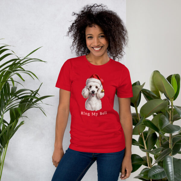 Smiling woman in red dog-themed Christmas t-shirt