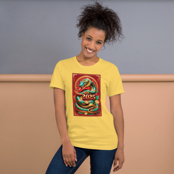 Woman wearing yellow dragon 2025 T-shirt, smiling.